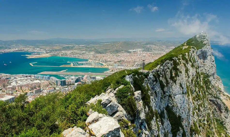 The Rock of Gibraltar rising above the coastline